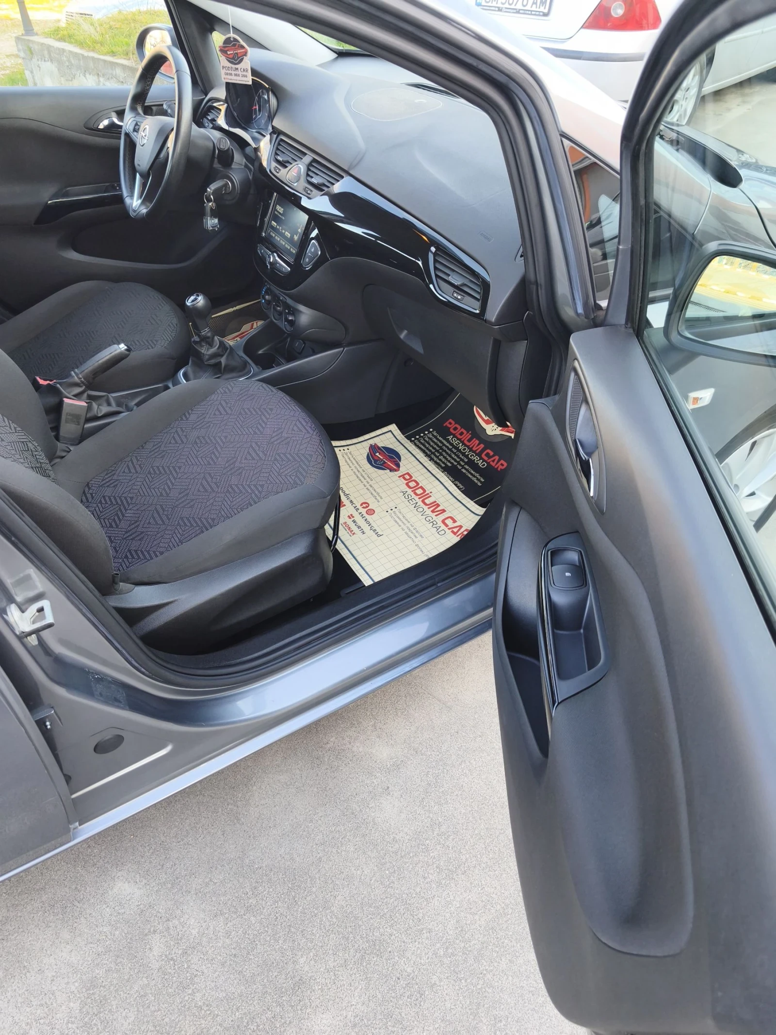 Opel Corsa 1.4i, снимка 16 - Автомобили и джипове - 54335850