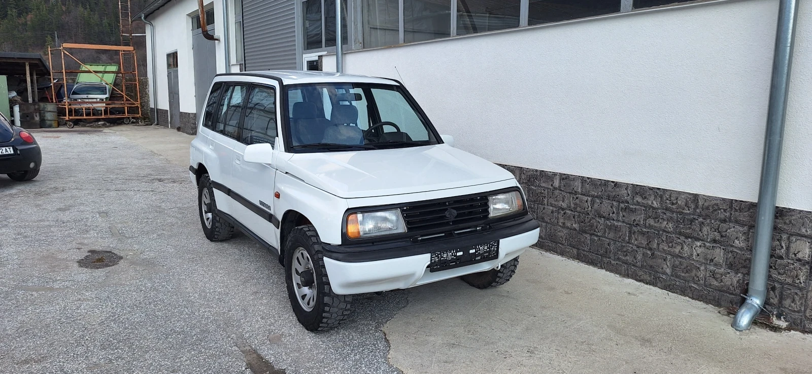 Suzuki Vitara 1.6i, снимка 12 - Автомобили и джипове - 55524222