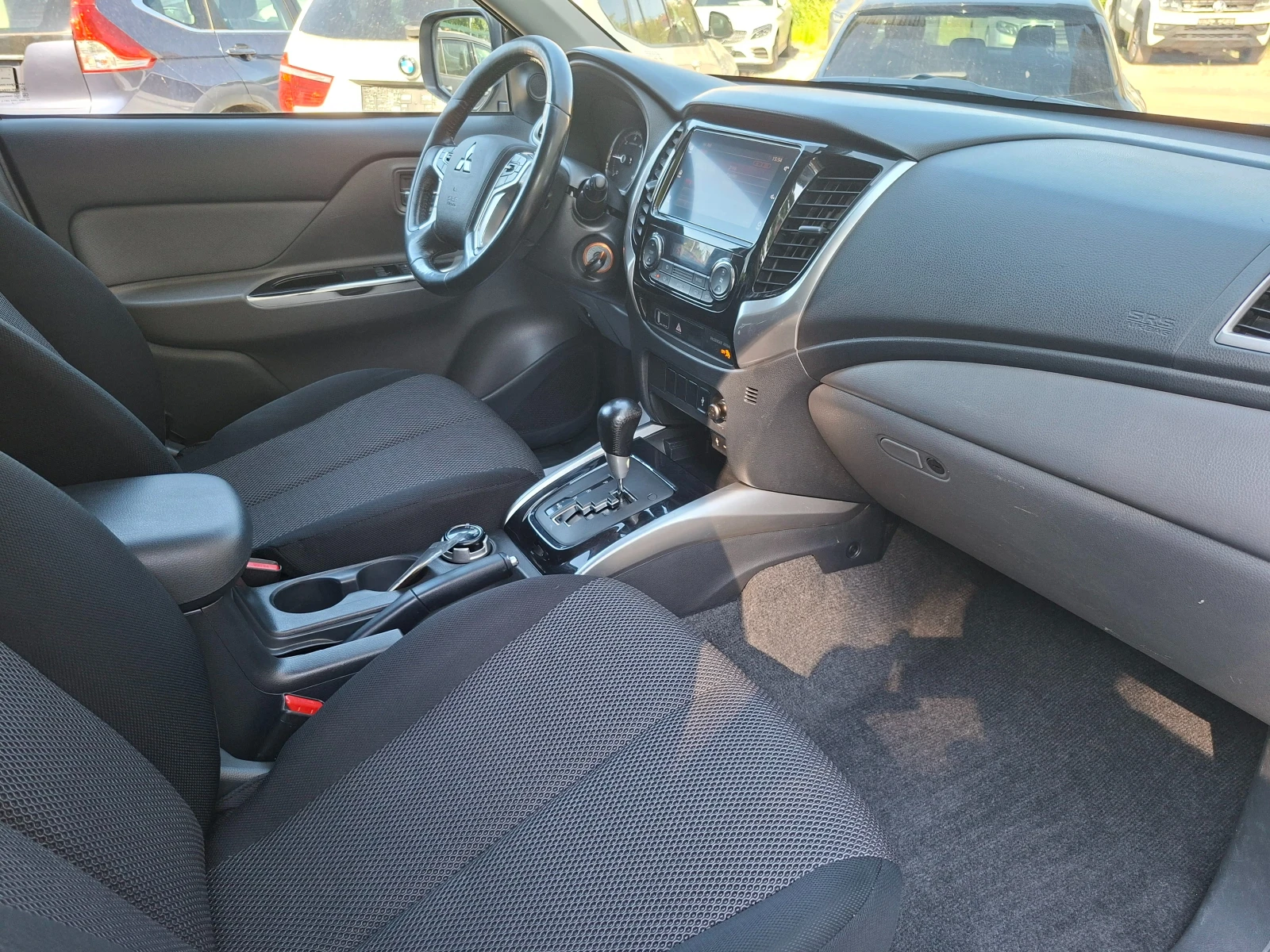 Mitsubishi L200 2.4 ШВЕЙЦАРИЯ 181кс., снимка 15 - Автомобили и джипове - 55628692