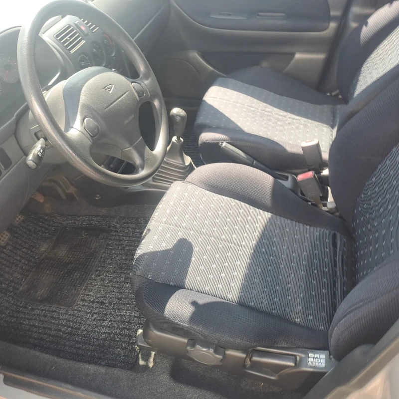 Daihatsu Sirion, снимка 7 - Автомобили и джипове - 50775972