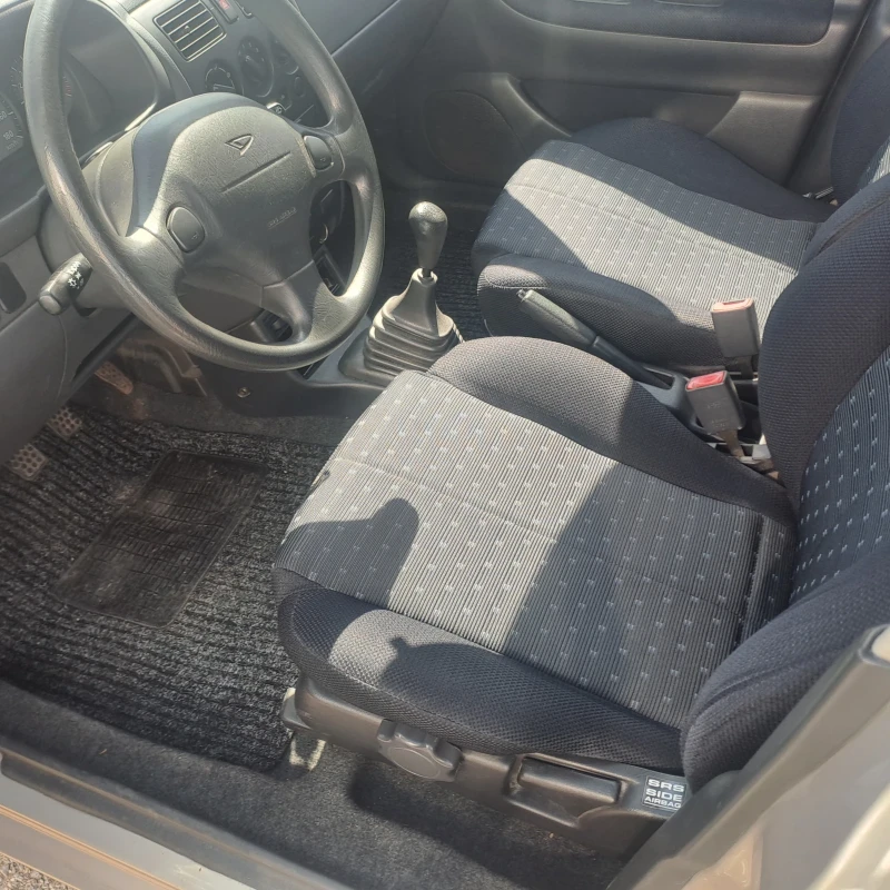 Daihatsu Sirion, снимка 8 - Автомобили и джипове - 50775972