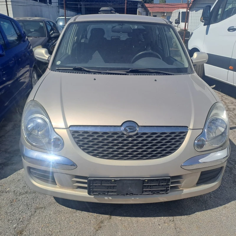 Daihatsu Sirion, снимка 4 - Автомобили и джипове - 50775972