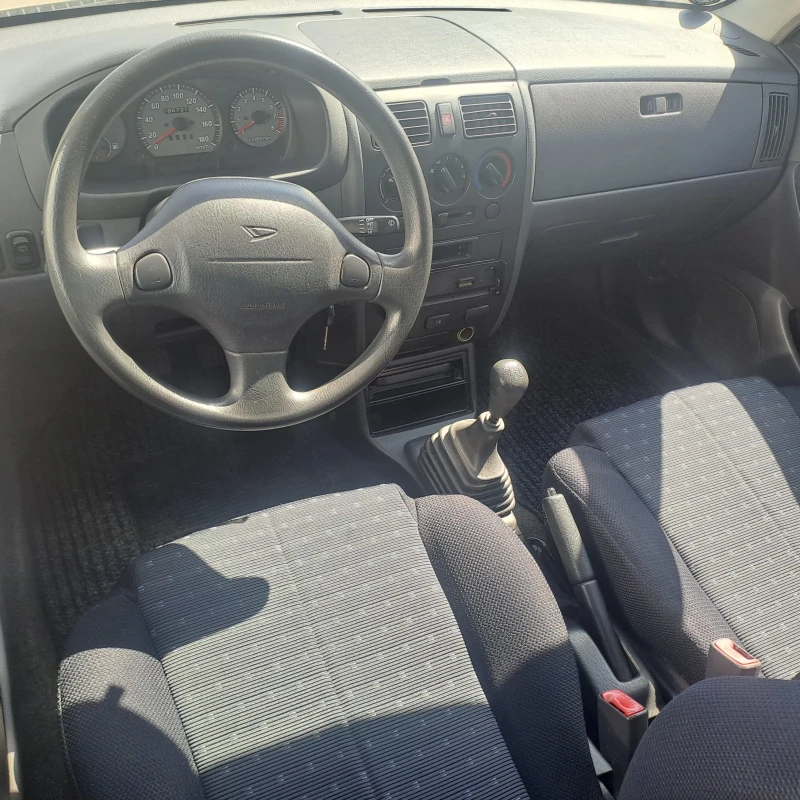 Daihatsu Sirion, снимка 11 - Автомобили и джипове - 50775972