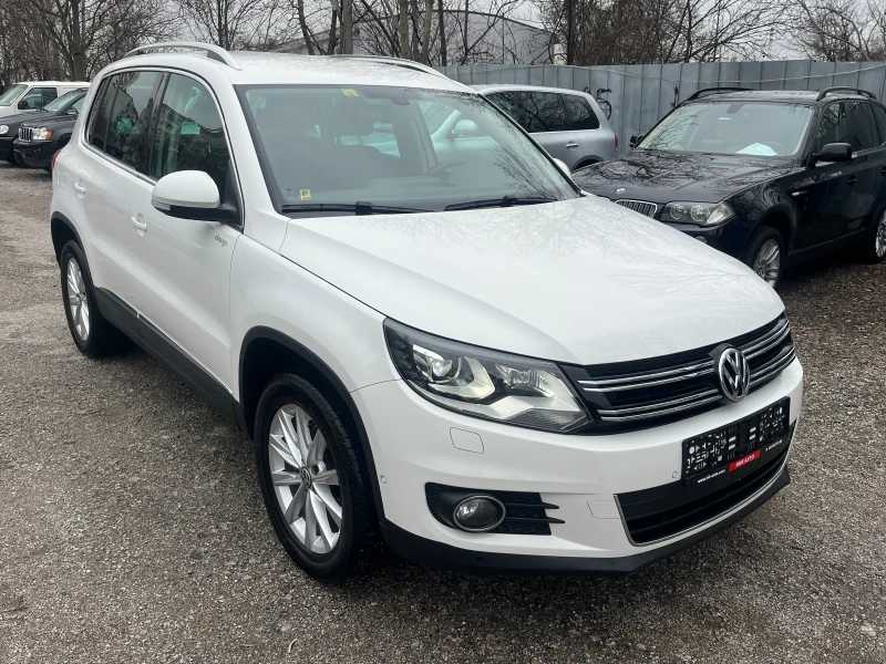 VW Tiguan 2.0 TSI 4x4 DSG Sport&Style, снимка 2 - Автомобили и джипове - 46171079