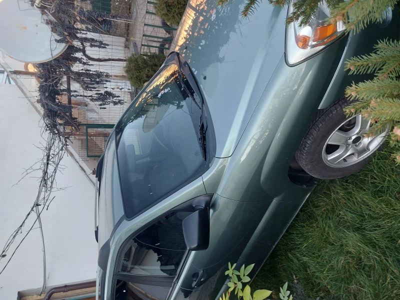 Kia Sportage, снимка 15 - Автомобили и джипове - 52739565