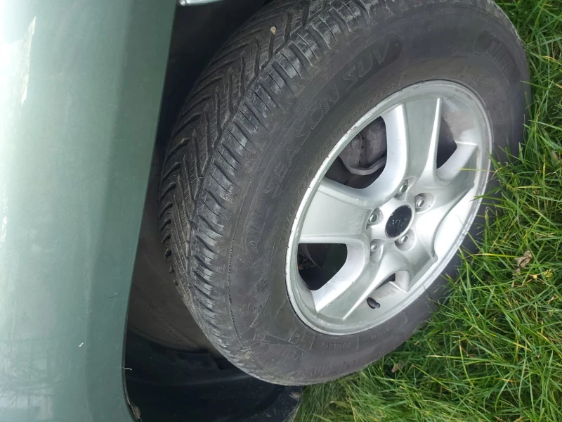 Kia Sportage, снимка 14 - Автомобили и джипове - 52739565