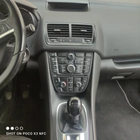Opel Meriva 1.4 блутут, хендсфри, аукс, автопилот , снимка 11