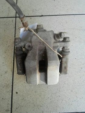 Спирачен апарат заден десен Тойота Рав4 2.0Б 07г.