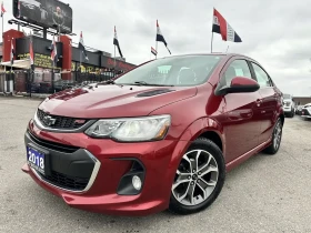 Chevrolet Aveo Sonic 1.8 LT RS Line CAM CARPLAY CRUISE БЕЗ ЩЕТИ, снимка 1