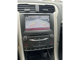 Ford Fusion * SE 4dr Front wheel Drive Sedan Automatic * CARFA - 9999 € / 19556.34 лв. - 70378869 11