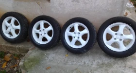        185/60R15  Suzuki Swift