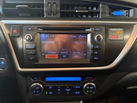 Toyota Auris Хибрид-Газ, снимка 11