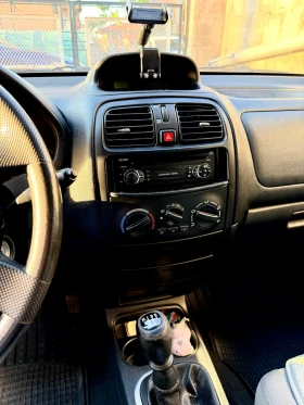 Mitsubishi Space star 1.6 96кс Перфектен, снимка 8