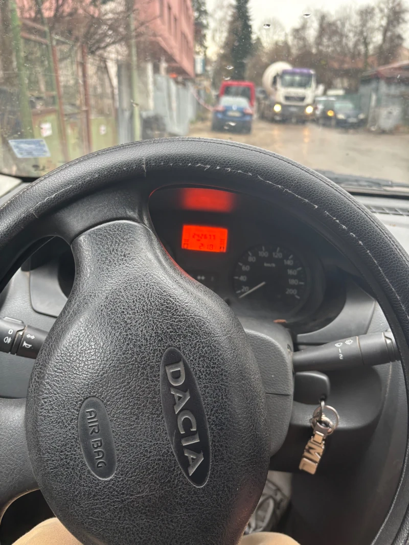 Dacia Logan, снимка 9 - Автомобили и джипове - 52672523