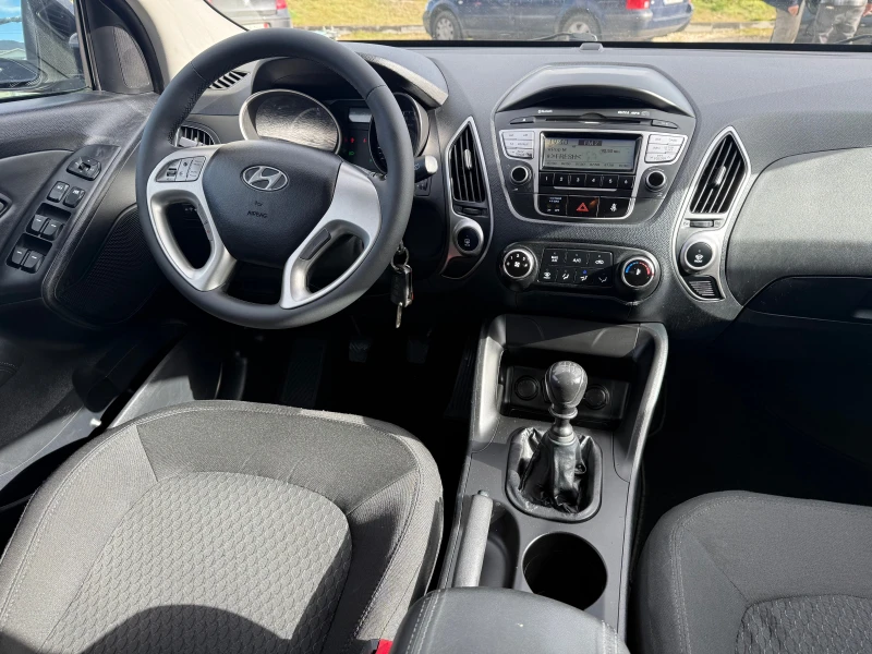Hyundai IX35 2.0CRDi, 4WD, снимка 12 - Автомобили и джипове - 53259048