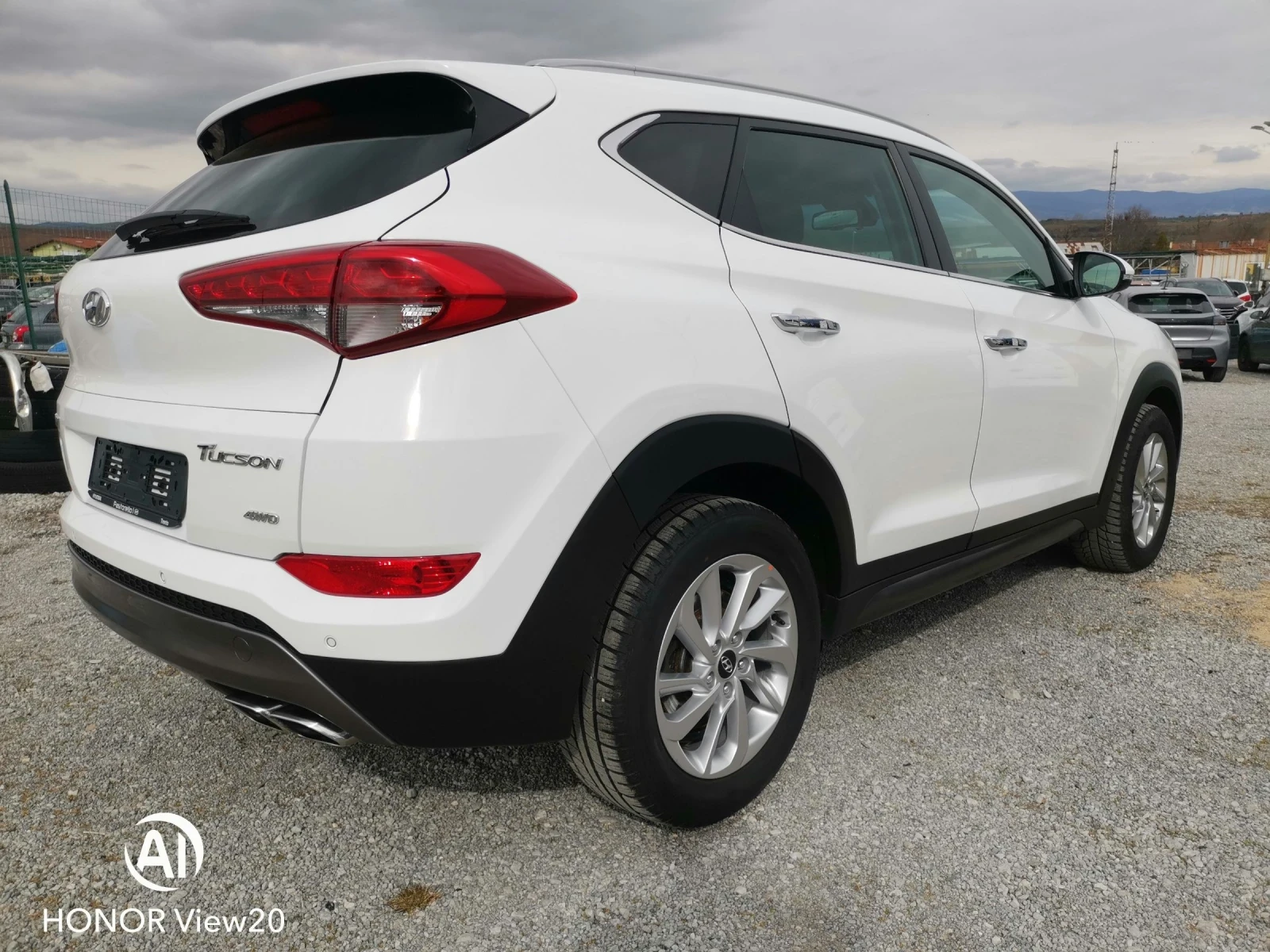 Hyundai Tucson 2.0 4х4, снимка 6 - Автомобили и джипове - 54310930
