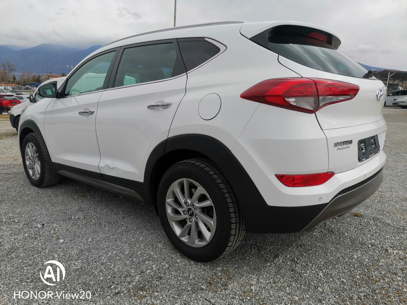 Hyundai Tucson 2.0 4х4, снимка 5 - Автомобили и джипове - 54310930