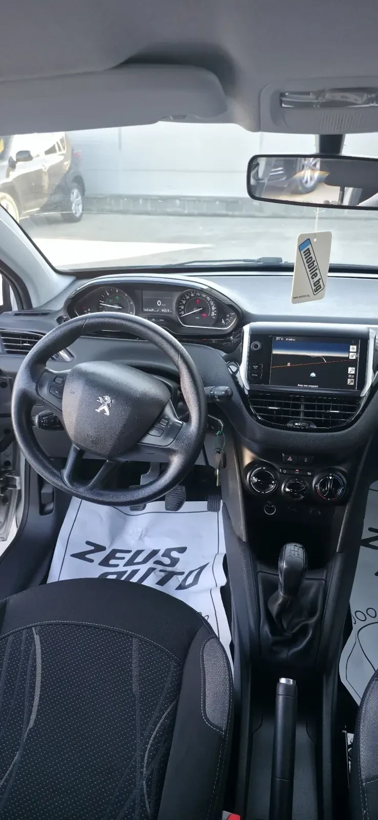 Peugeot 208 1.4 HDi /68 к. с, снимка 7 - Автомобили и джипове - 55237303