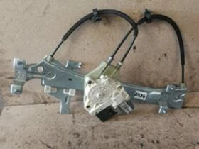 Стъклоповдигач заден ляв  Renault Megane Iii  2008-2013 , снимка 1