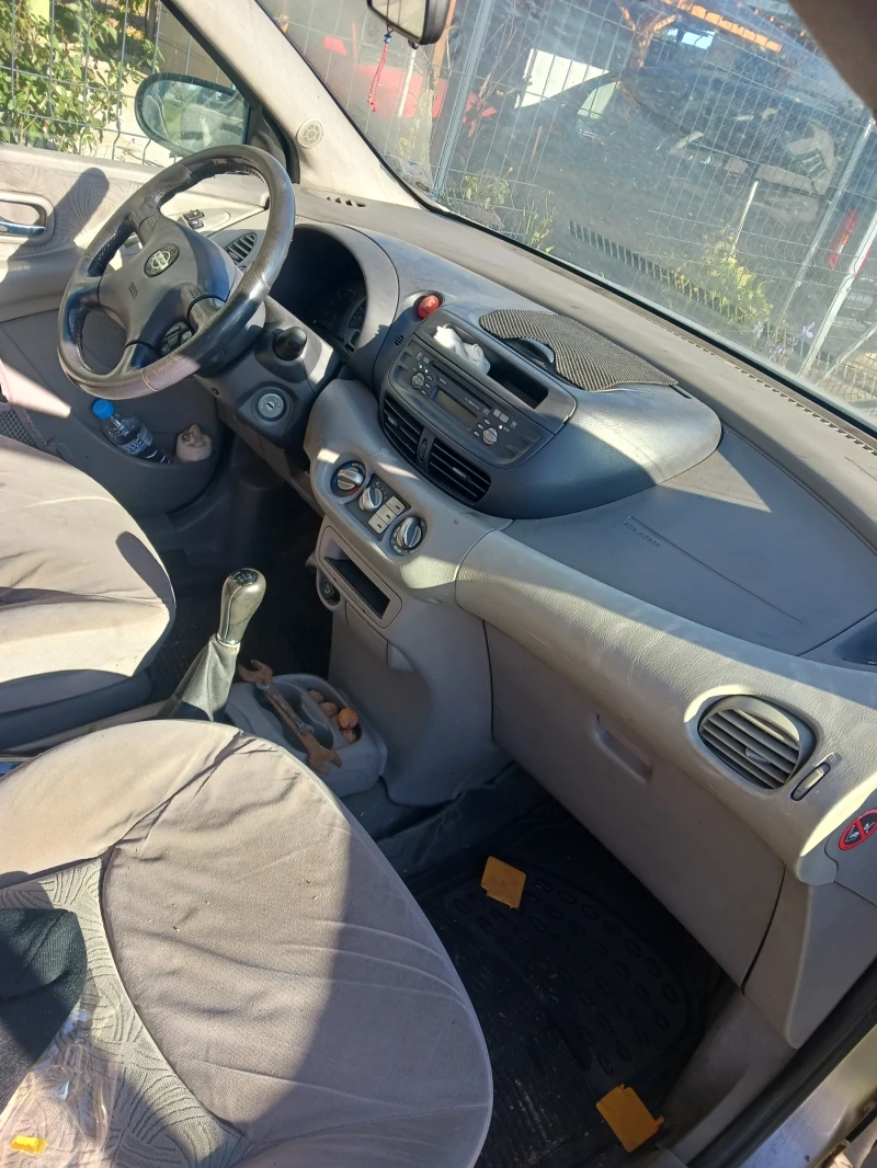 Nissan Almera tino, снимка 3 - Автомобили и джипове - 52394213