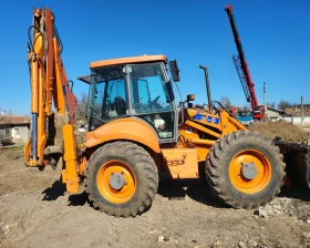 Багер New Holland  - изображение 1