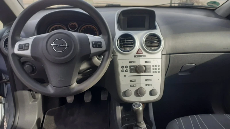 Opel Corsa 1.2i klimatik , снимка 12 - Автомобили и джипове - 48929370