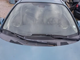 Челно стъкло за Нисан Примера П12, снимка 1