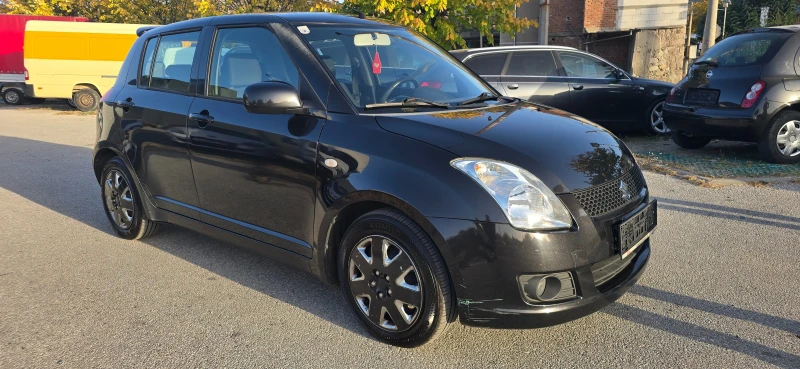 Suzuki Swift 1.3i 5вр клима, снимка 3 - Автомобили и джипове - 47887019