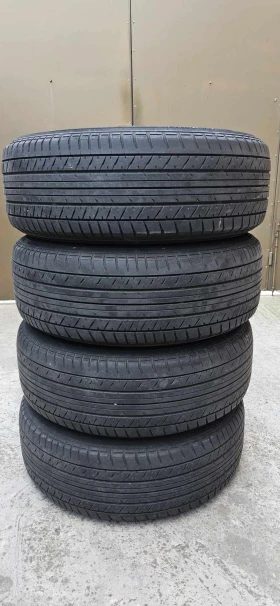 Гуми Всесезонни 215/65R16, снимка 1 - Гуми и джанти - 48758852