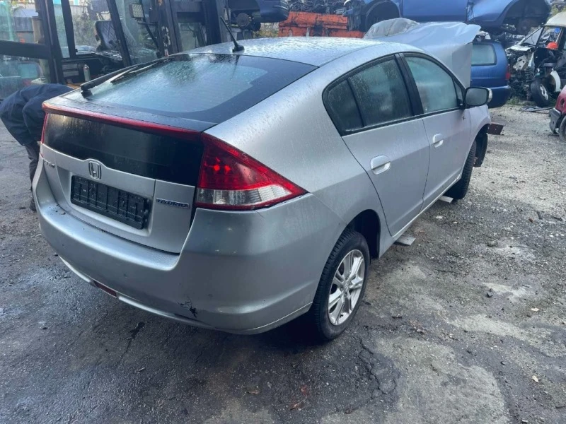 Honda Insight 1.4 HYBRID, снимка 1 - Автомобили и джипове - 43256957