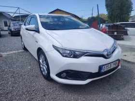 Toyota Auris 1, 8-hybrid, face - 19850 лв. - 25051601 2