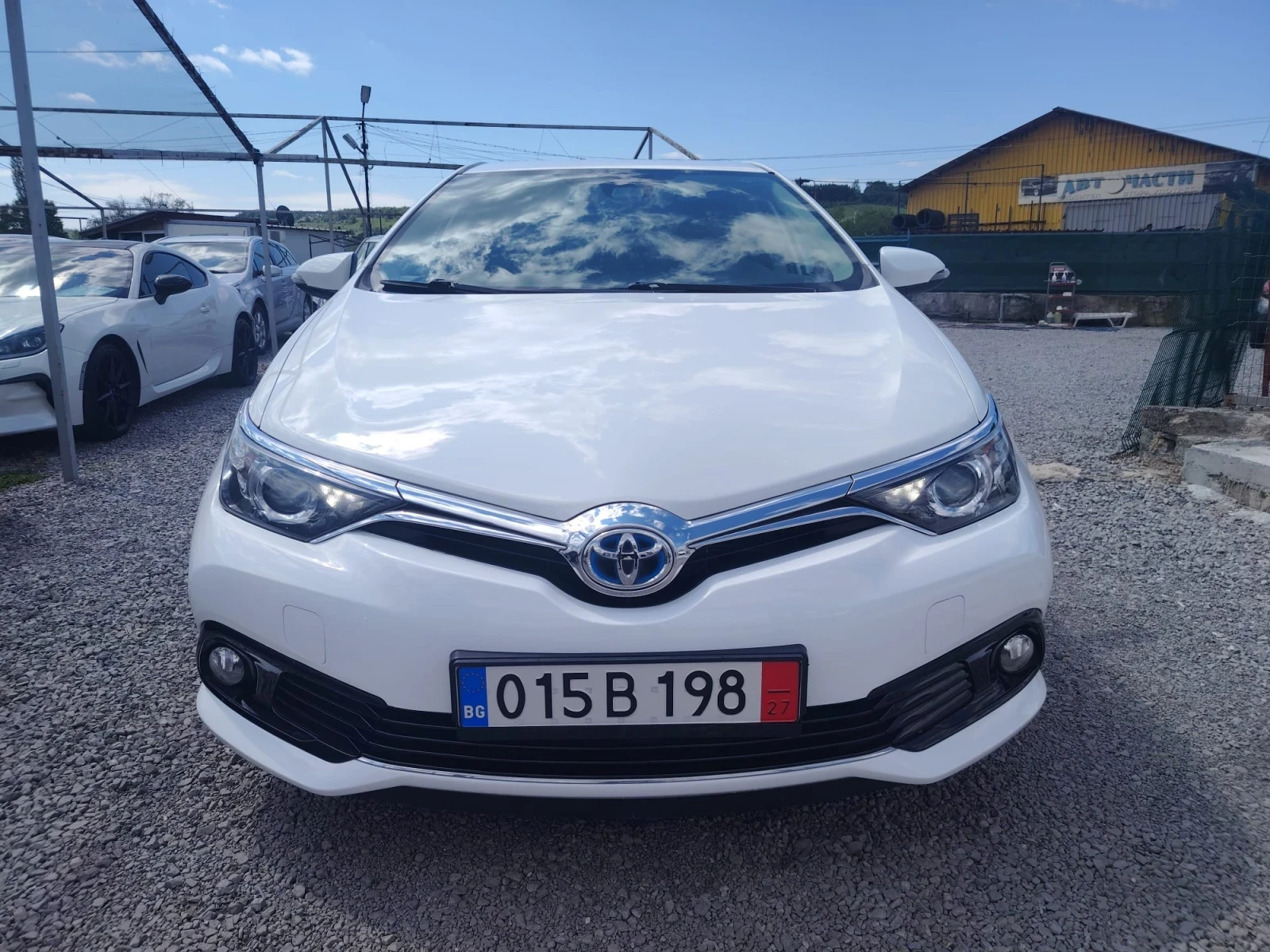 Toyota Auris 1, 8-hybrid, face - изображение 3