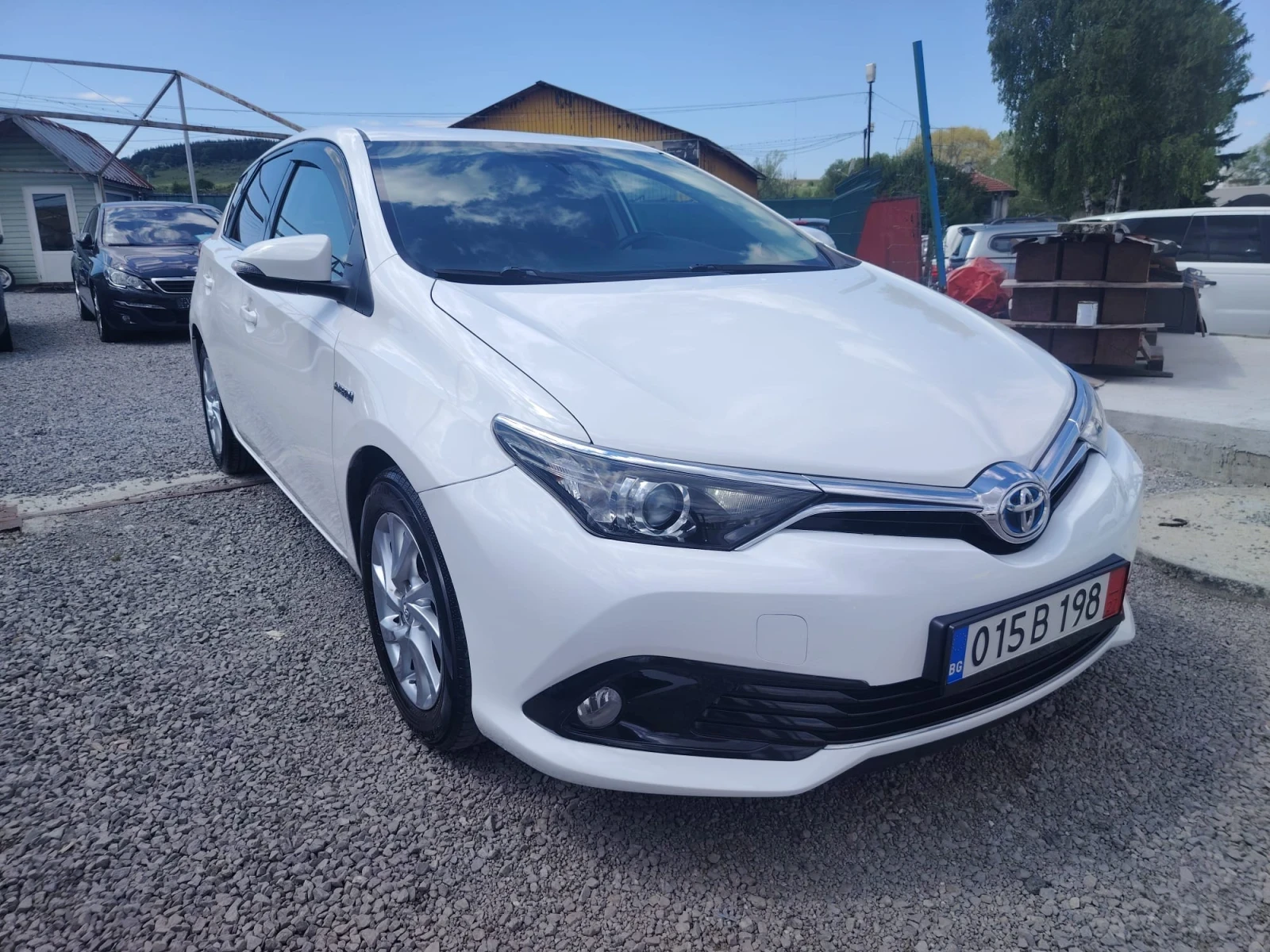 Toyota Auris 1, 8-hybrid, face - изображение 2