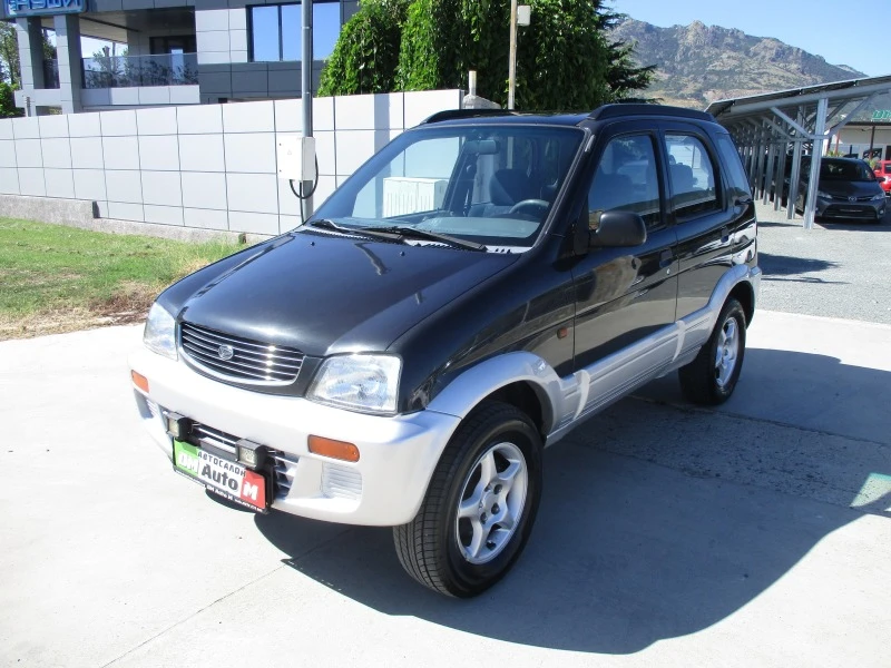 Daihatsu Terios 1.3/БЕНЗИН/КАТО НОВА, снимка 8 - Автомобили и джипове - 46770276