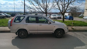 Honda Cr-v, снимка 16 - Автомобили и джипове - 52946277