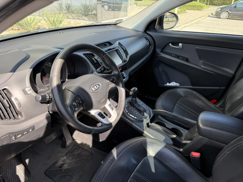 Kia Sportage 2.0 CRDI, снимка 9 - Автомобили и джипове - 52890898