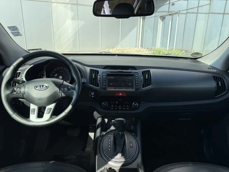 Kia Sportage 2.0 CRDI, снимка 8 - Автомобили и джипове - 52890898