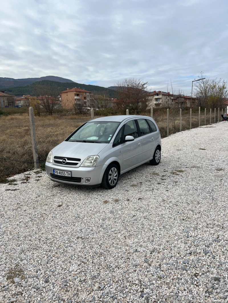 Opel Meriva 1.8 i 125 кс, снимка 11 - Автомобили и джипове - 45402913