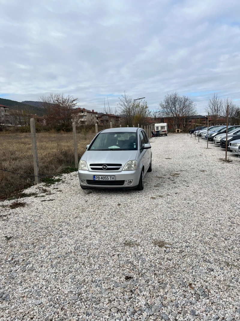 Opel Meriva 1.8 i 125 кс, снимка 10 - Автомобили и джипове - 45402913