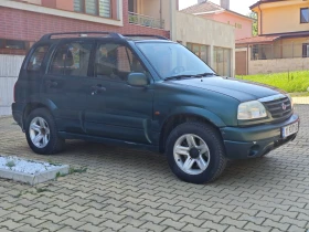 Обява за продажба на Suzuki Grand vitara 2.5i КЛИМАТИК ВЕРИГА ГАЗ 4X4 ОБСЛУЖЕН ~9 500 лв. - изображение 4