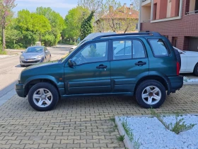 Обява за продажба на Suzuki Grand vitara 2.5i КЛИМАТИК ВЕРИГА ГАЗ 4X4 ОБСЛУЖЕН ~9 500 лв. - изображение 1