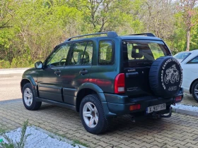 Обява за продажба на Suzuki Grand vitara 2.5i КЛИМАТИК ВЕРИГА ГАЗ 4X4 ОБСЛУЖЕН ~9 500 лв. - изображение 2