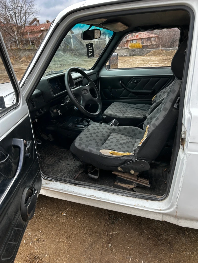 Lada Niva 1.7i, снимка 12 - Автомобили и джипове - 48322306