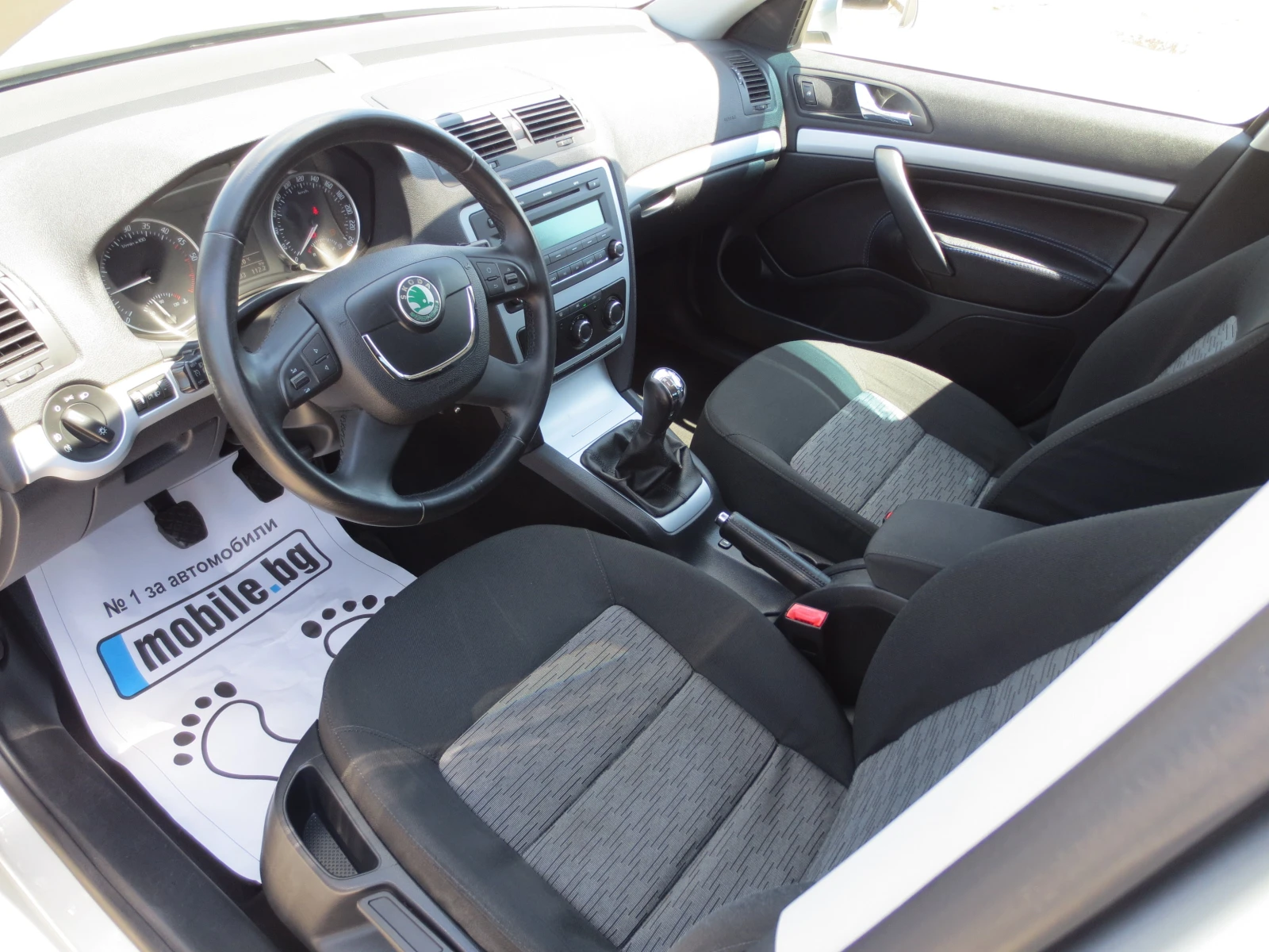 Skoda Octavia 1.6 TDI, снимка 9 - Автомобили и джипове - 54680011