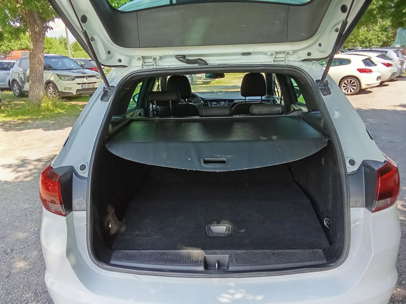 Opel Astra 1.6 CDTI, снимка 15 - Автомобили и джипове - 54856548