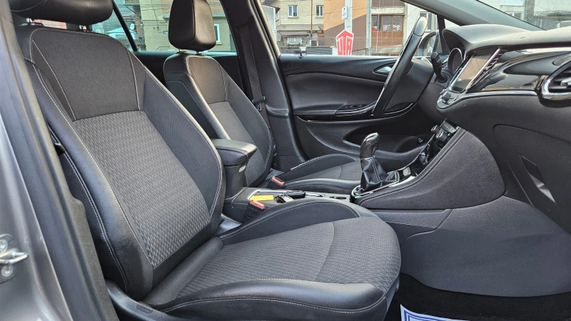 Opel Astra 1.6 CDTI NAVIG/KLIMATTONIK/6skorosti, снимка 13 - Автомобили и джипове - 53407316