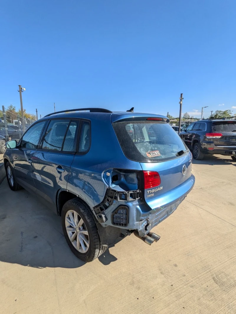 VW Tiguan 2.0 tsi, снимка 13 - Автомобили и джипове - 52706874