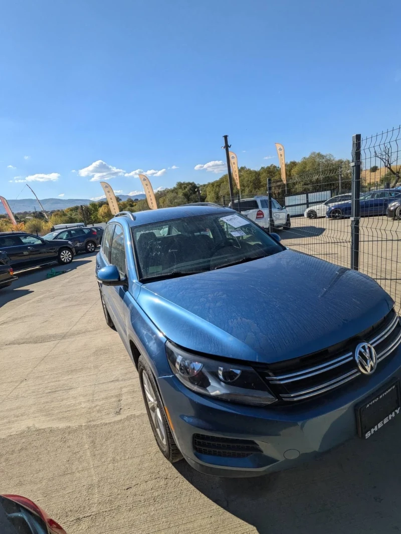 VW Tiguan 2.0 tsi, снимка 11 - Автомобили и джипове - 52706874