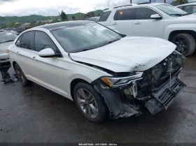 VW Jetta 1.5L I-4 DI, DOHC, VVT, TURBO, 158HP Front Wheel