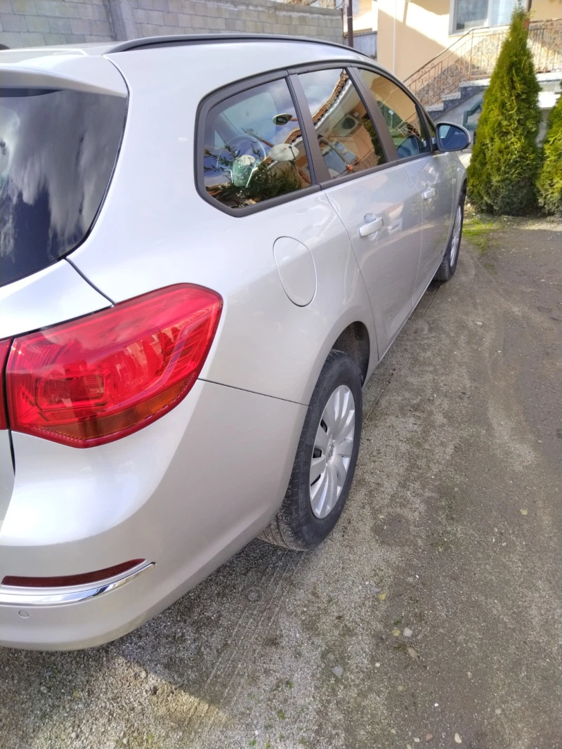 Opel Astra 1.6 diesel 110кс., снимка 13 - Автомобили и джипове - 47252462